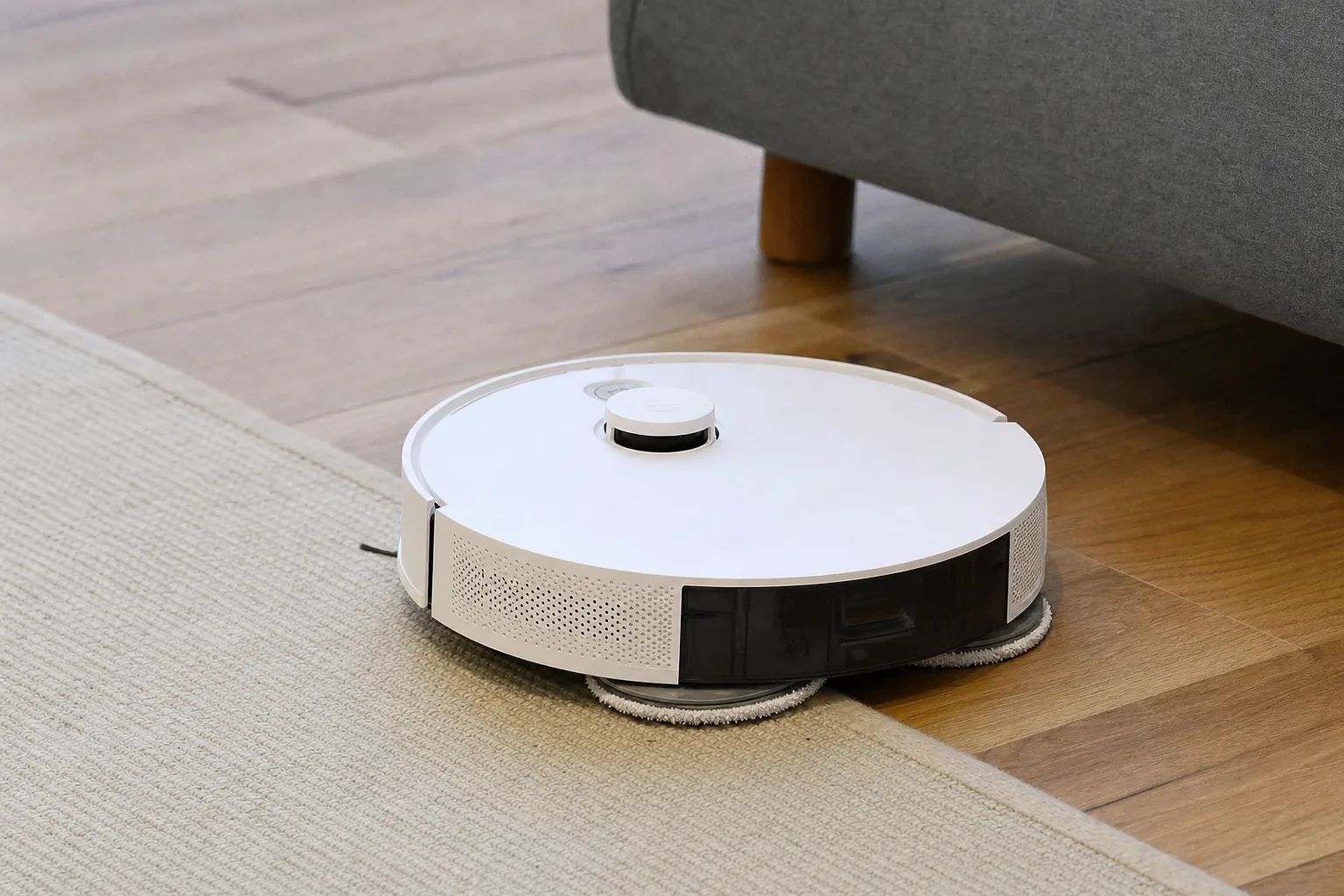 Comparatif : Aspirateur robot laveur et aspirateur vertical — Critères de Performance : Autonomie et Capacité de Nettoyage